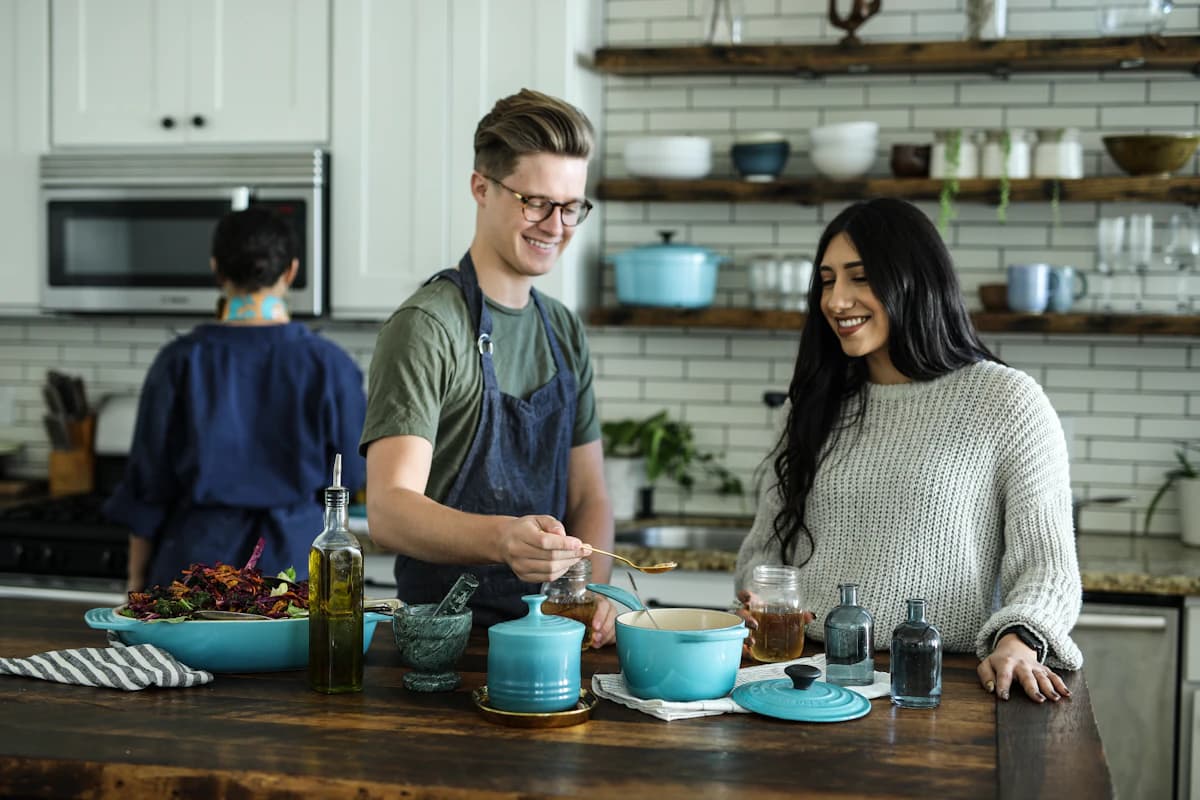 A couple cooking together with quality cookware